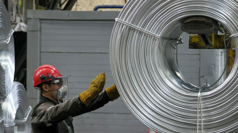 TASS-A worker wears a hard hat at the Irkutsk Aluminum Smelter (IrkAZ)